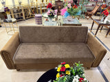 Brown sofa cumbed