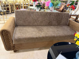 Brown sofa cumbed