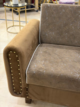 Brown sofa cumbed