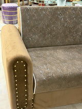 Brown sofa cumbed