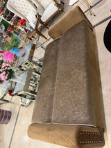 Brown sofa cumbed