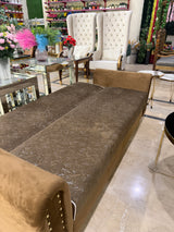 Brown sofa cumbed