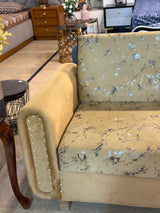 Golden sofa cumbed